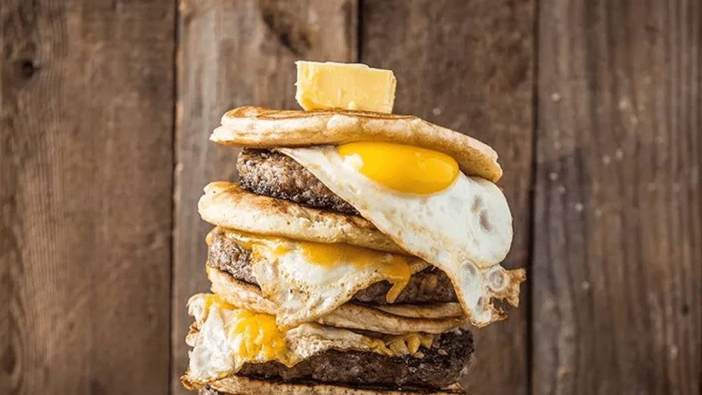 Burgers and pancakes cooked on Blackstone Original 17” Griddle Gas Tabletop Grill 2143eu g