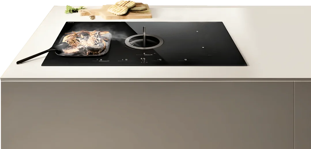 Cooking on NikolaTesla extractor hob with built-in ventilation system