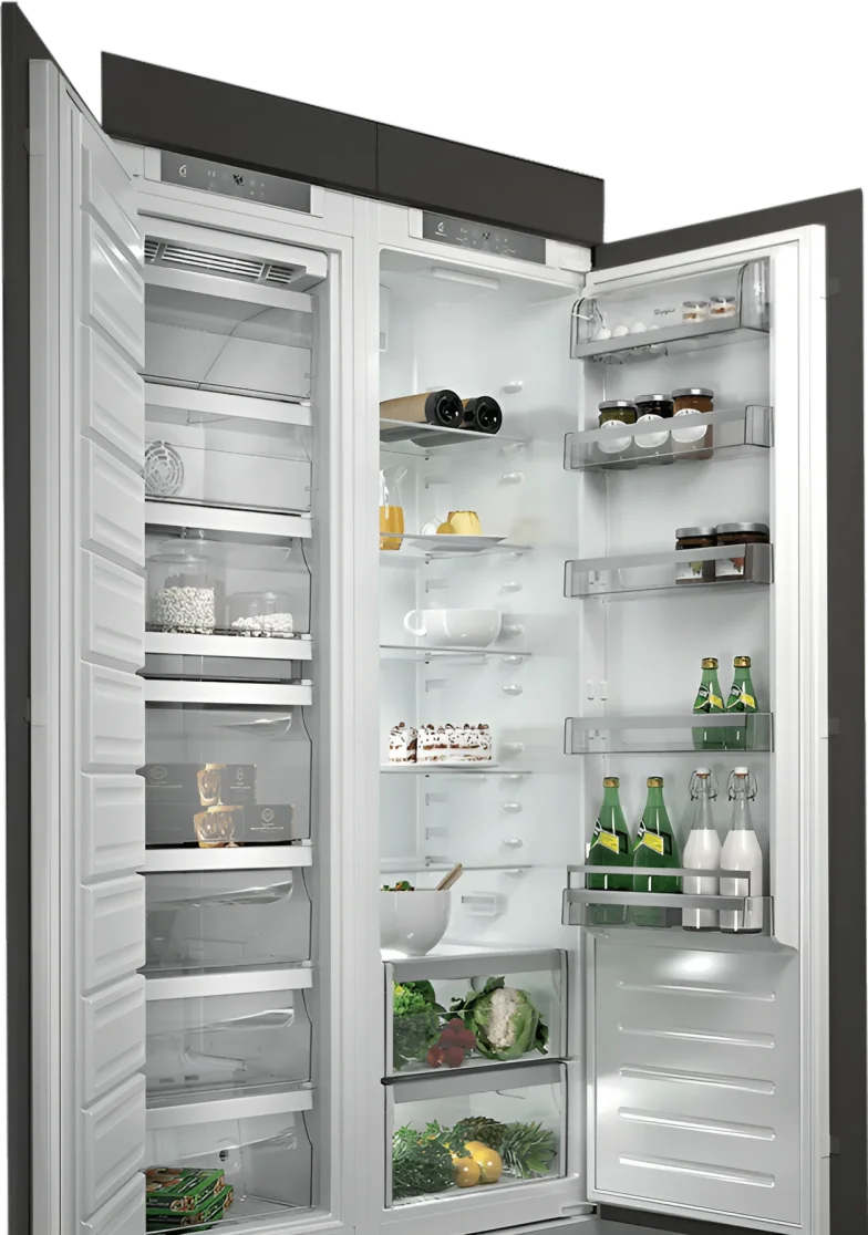 Built-in fridge and freezer showing shelves with food and drinks